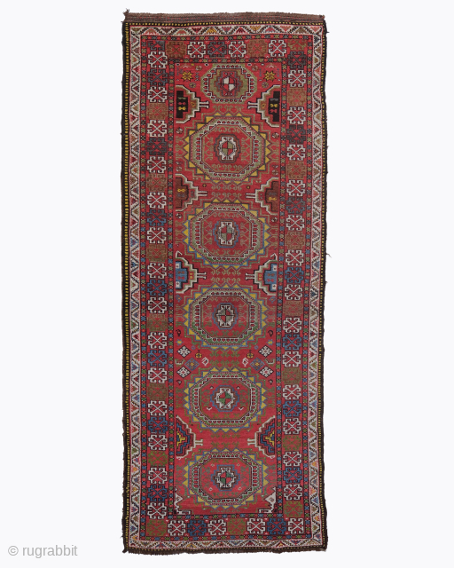Period: Early 20th Century
Origin: Iran
Dimensions: 110 x 310 cm

This rare, early 20th-century Kurdish runner is a magnificent and powerfully expressive testament to the nomadic and village weaving traditions of the Kurdish tribes,  ...