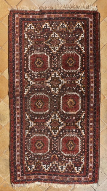 Salar Khani Baluch with striking design and colors (208x107cm). If you can go through some conditions issues like the stain of bleach on the back and some parts of the headens missing  ...