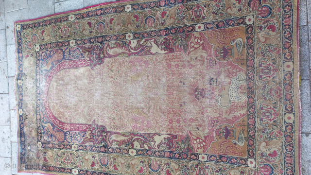 Hello. Does anyone know what type of carpet this is? Isfahan, Tehran or Kerman. It has a lion with a king's head and a scorpion's tail on it. What is called a  ...
