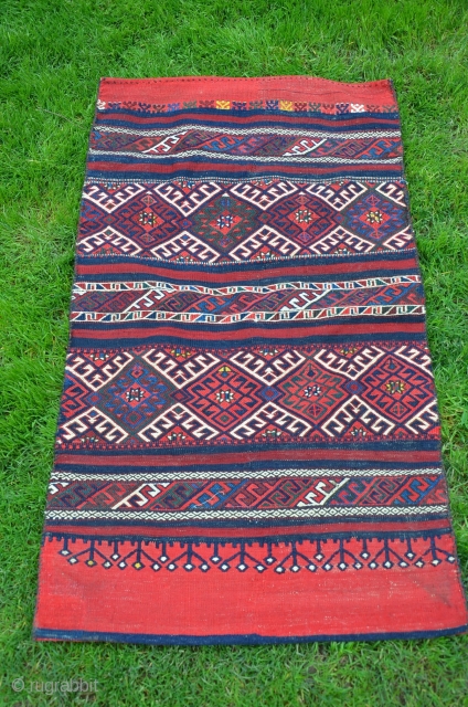 Western Anatolian flatwoven çuval (Karakeçili). 48 in. X 27-1/2 in. Circa 1900. All natural dyes. Reciprocal brocaded designs on face and striped plainwoven back. Almost perfect unused condition.     