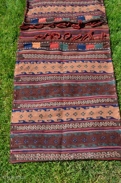 Shahsavan of Varamin flat woven khorjin. 5'2"X 2'1". Wool. All warm natural dyes. Circa 1900. Excellent condition. Similar to example in Tanavoli's "Rustic and Tribal Weaves from Varamin" Pl. 45 p.76. Minute  ...