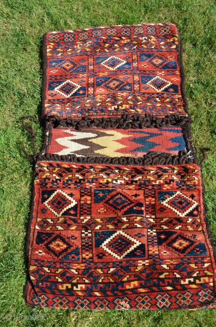 Antique Kyrgyz pile khorjin. 3'8" X1'11-1/2". Circa 1900. All wool. Saturated natural dyes. Full luxuriant pile. Decorated bridge. Plainwoven back. Nearly perfect condition.          