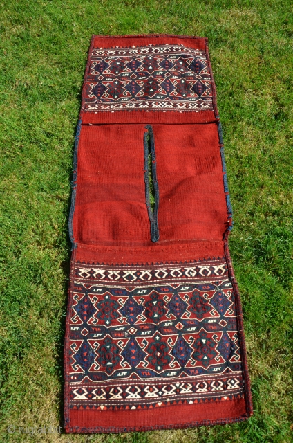 Rare antique Karayagci (Western Anatolia) heybe. 5'1" X 1'8". Circa 1900. Wool with cotton design elements. Deeply saturated natural dyes. Maintained in nearly perfect condition. For comparisons see Pinkwart and Steiner "Bergama  ...