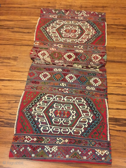 Malataya kilim heybe 56”X27”. Early 20th.C. Wool and cotton (white designs). Intensely saturated and beautiful natural dyes. Plainwoven striped back. Open along sides. Excellent condition.        