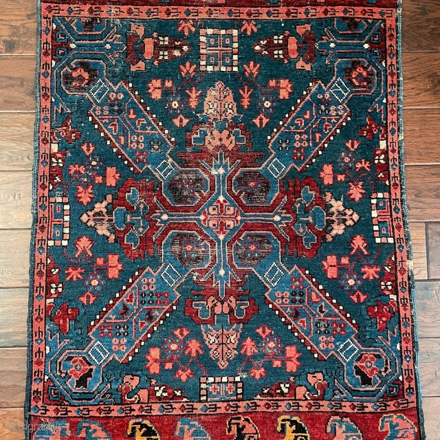 Antique Zeikhur squarish small rug,depicting St. Andrew's Cross, measuring 2-9.5 × 3-6.5. A similar example was recently sold at Grogan.             