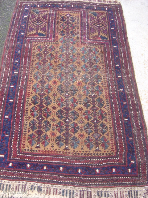   nice baluch prayer rug with really nice colors and design 19th centery and there is some repair on the field.           