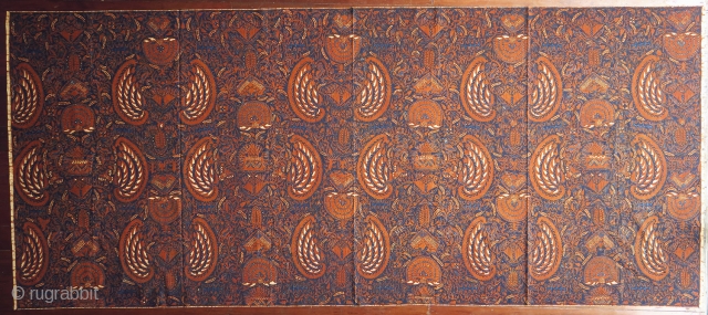 Batik skirt cloth (kain panjang)

Origin: Indonesia, Java, Yogyakarta, c. 1950

Technique: Hand-drawn (tulis) batik, natural indigo and soga dyes

Description: A densely drawn, semi-abstract design belonging to the most complex group of semen (from  ...