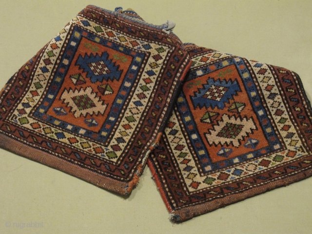 Env. 118190. 19'th Century, Trans_Caucasus, Armenian Complete Pile Saddlebag. Great Spacious composition and colors. It has a minute mothbite. Otherwise very good condition. The Size is  1'2" by 3'6".   