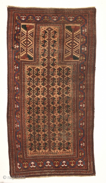 Late 19th century Baluch prayer rug with a colorful border. Measures 150cm x 81cm. All natural colors.                
