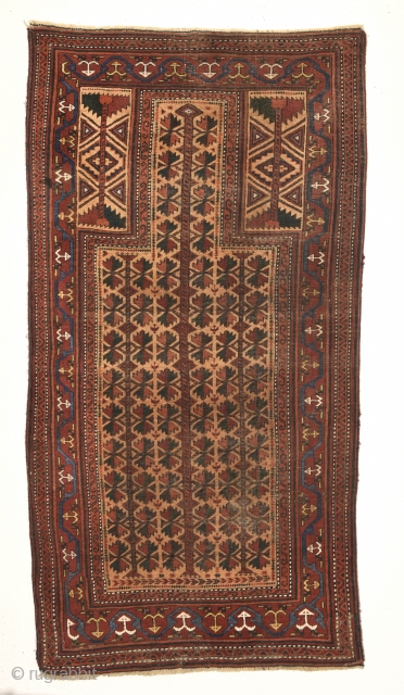 Late 19th century Baluch prayer rug with a colorful border. Measures 150cm x 81cm. All natural colors.                