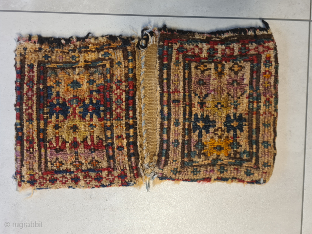 Beautiful, rare antique Shahsavan Shilaki miniature Khorjin saddlebag (also called a children's saddlebag), measuring 36 x 21 cm, with Verneh brooches.

Please contact me only directly: 

goekay.sargin@yahoo.de       