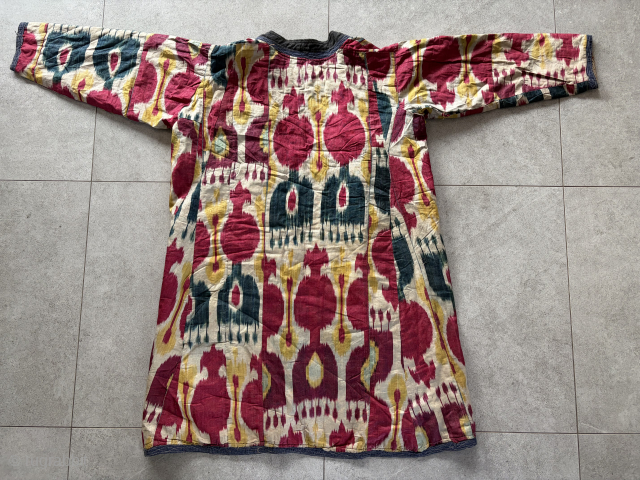 Antique silk uzbek Ikat chapan (coat) from central Asia, probably for children
~ beginn of 20 Century
maximum height is 99 cm and the maximum width is 152 cm; it is relatively lightweight ...