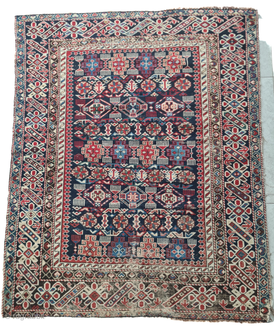Antique Caucasian Kazak Chichi rug with beautiful natural colors. Low pile and signs of wear (see photos). The dark wool is corroded/oxidized with age. Nevertheless, a great example of its class. Dimensions:  ...