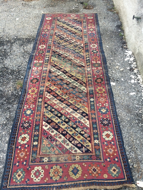 An antique Talish rug 3rd Q or earlier with ALL browns oxidized, some areas of wear, measuring 3'.5" * 10'  . Missing Original side cord and some of ends.  Unsuall  ...