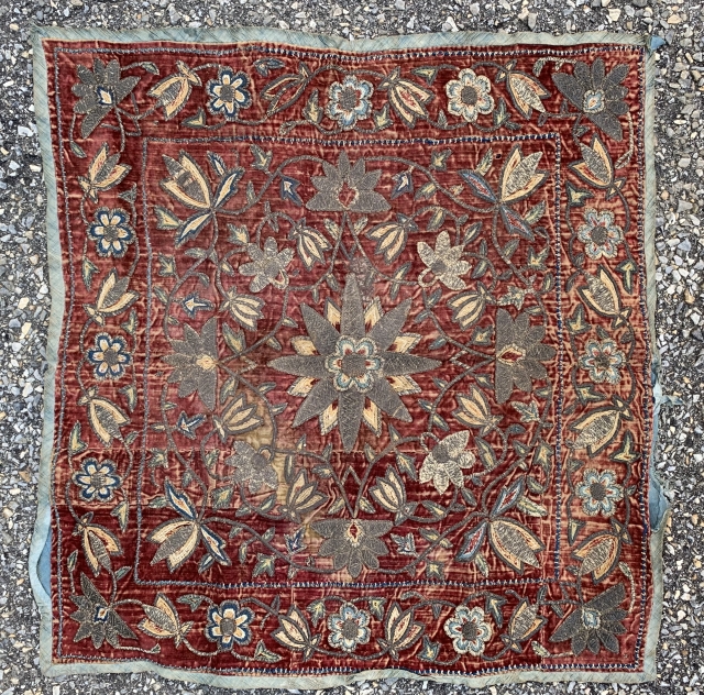 Persian textile with metal and silk on velvet, measuring 24” 26”
                      