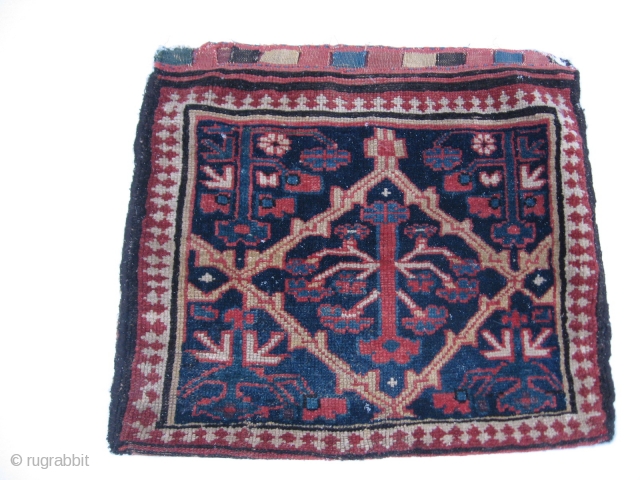  Persian Kurdish Bag in good condition. The kilim backside has some damages.  73x63 Cm. Pictures were taken in the snow. 
          