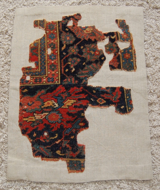 Ushak Rug - Border Fragment. Circa 16th century.  Mounted. Size of linen support (full size): 56x74cm, fragment size: about 46x64cm. Ushak rugs with this border design in the Museum of Turkish  ...