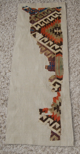 West Anatolian Kilim Fragment. Mounted. Size of linen support (full size): 58x158cm, fragment size: about 48x148cm.                 