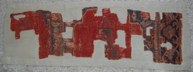 West Anatolian Ushak Saf Fragment. Mounted. Size of linen support (full size): 52x148cm, fragment size: about 42x138cm.                