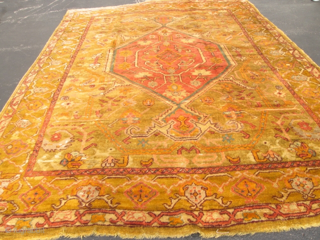 Amazing Antique Turkish Angora Oushak Rug.

stunning antique angora oushak. size 9'1'' x 12'3''. condition great pile allover.unique colors .very top quality silky wool.circa 1890. ends and sides intact. very decorative rug.  