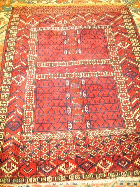 Antique Yomud Turkoman Rug.


size 5'x3'11'' condition very good low even pile.nice colors good knots quality.                  