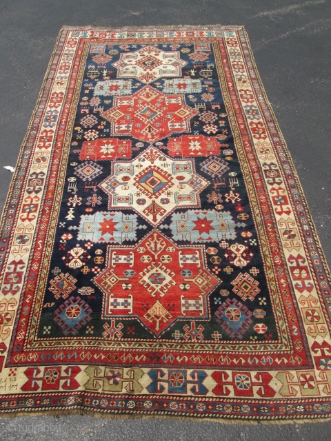 Exceptional Large 19Th Century Caucasian Shirvan Rug.

size 10'5''x5'6''. condition ,colors and design superb.date on the corner of the rug.very fine knots quality.add to your best collection.q email please.     