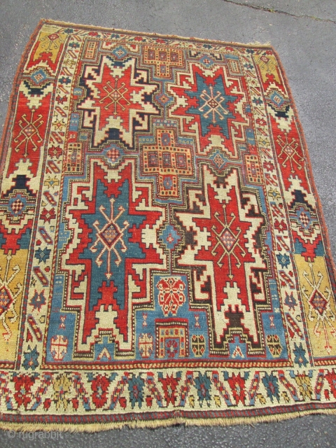 4'x5'9'' Exceptional Very Rare Leshghi Stars Caucasian Rug.

early 19th century Circa 1820 to 1840. condition very good for the age ,low even pile with small  oxidase brown old re pile .different  ...