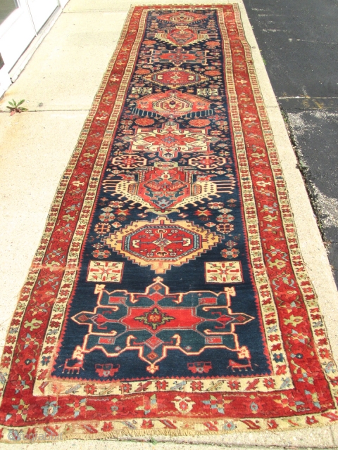 Awesome Antique Persian Serapi (karaja) Rug.

size 12'7''x3'7''. condition good pile .need some re pile .see photosPlease. Circa 1890.no wholes.              