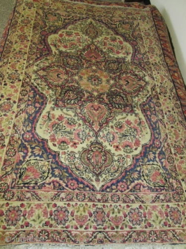 Very Pleasant Antique Persian Laver Kerman Rug.

size 5'10''x3'8'' .condition very good pile.ends and sides intact.                  