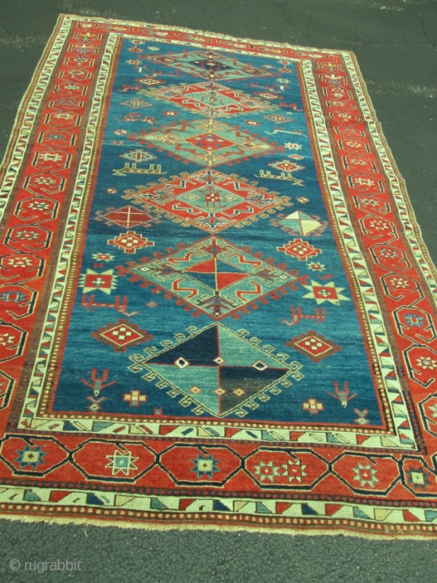 Outstanding Antique Caucasian Kazak.

size 5'3''x8'2''.                            