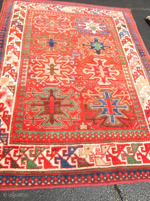 Antique Caucasian Kazak.

Size 4'4''x6'5'' good condition. low price.                         