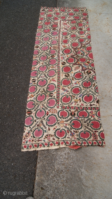 this a 19th century suznai fragment. size 2.4x6.10                         