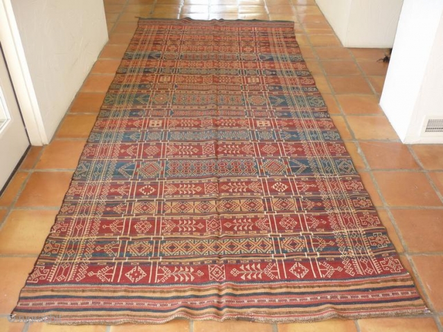 Nushki belouch kilim,w/ reverse brocade, indigos, weld  and madder, cropped edges but none better.wonderful iconography as well aprox 5 x10 price reduced sept 10, 2018       