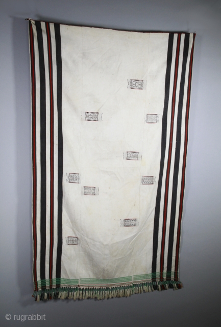 Angami Naga shawl, 
woven red and black stripes and patterns, 
white cotton. 
State of Nagaland, Northeast India. 
137 x 81 cm. 
Very good condition. 
Early to mid 20th century.    