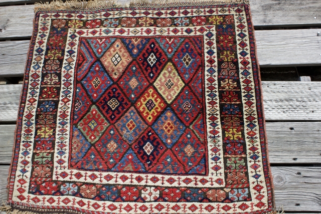 Early 20th century Persian Jaff Kurd diagonal hooked diamonds single bag face without back, size: 2'9" x 2'6".  Small rewoven spot otherwise in excellent condition.  Top and bottom end in  ...