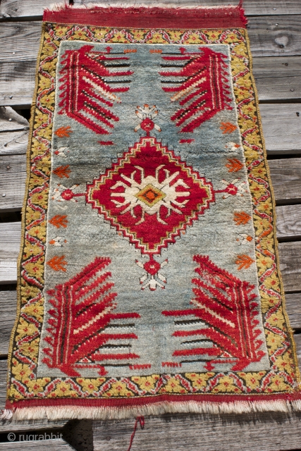 Late 19th cent Anatolian Konieh yastiklyk with some apron intact and some needle and thread repair,  Peacock motif in 4 corners.  Size: 3'5" x 1'9".      