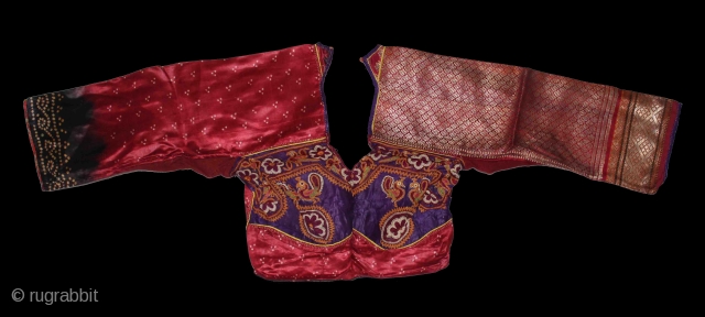 Child's(choli) from Bansali Community,kutch,Gujarat india early 20th century. Left side panel used Amar Brocade. Right side panel used Aba Silk Fabric.Perfect condition.(DSC01225).           