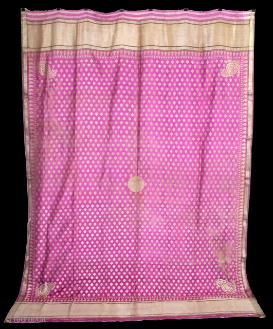 Odhni Zari Brocade(Real Silver and Gold) from Jamnagar Gujarat India..The pattern is made up of kairi,paisley, placed as a konia at the corners of the pallu.The broad plain chaudani pallu is outlined  ...