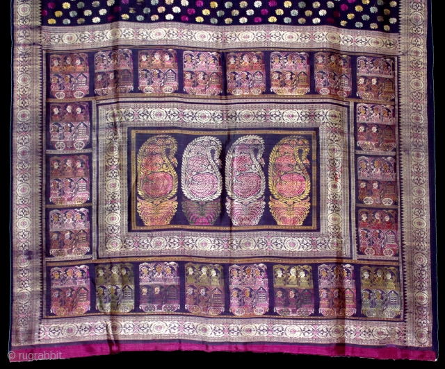 Pallav of a Baluchar Sari woven in silk Brocade From Murshidabad,West Bengal,India.The motifs of butta cones and Figures of Europeans travelling in railway carriages.British administrators were instrumental in reviving the industry there  ...