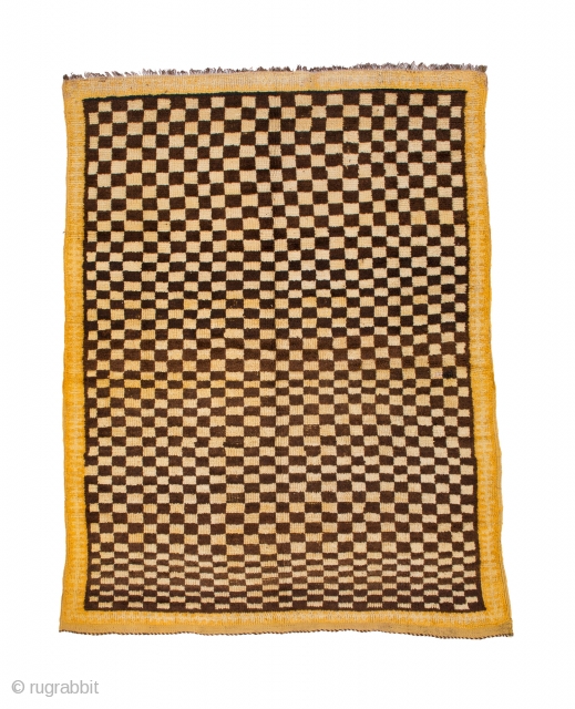 TM 1966, rare Ait Ouaouzguite checkerboard rug, Jebel Siroua region, southern Morocco, mid 20th century, 195 x 150 cm (6' 6'' x 5'), (very) good condition. 

www.berber-arts.com      