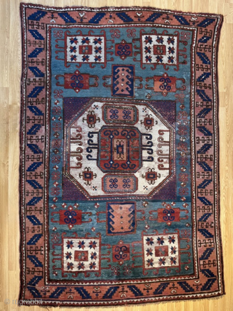 Battered mid-19th century blue ground Karachov, in useable condition. 2.17m by 1.50m
Contact gene@heritage-antique-rugs.com for more pics, price etc.               