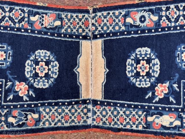 Antique Chinese saddle rug for the Tibetan market. Good condition, good colours.
1,22m by 0.63m
Contact gene@heritage-antique-rugs.com for more pics, price etc.             