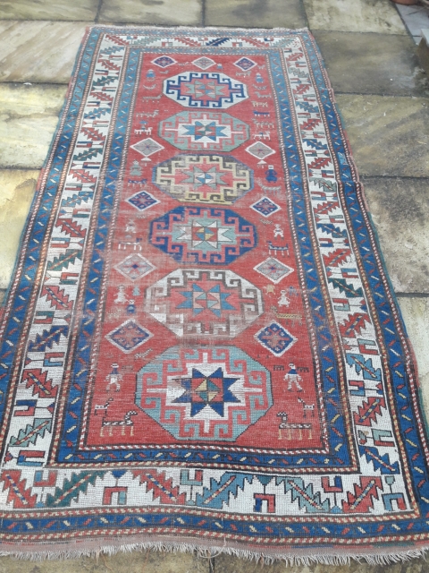 Late 19th century kazak longrug, worn but fun
2.60m by 1.35m                       