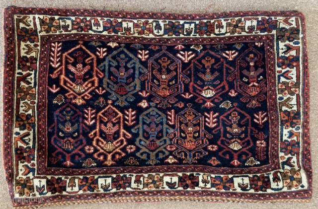 Large Afshar saddle bag, c.1900, with unusual design. Very good condition.
79cm by 50cm

 Visit www.heritage-antique-rugs.com for more images and price             