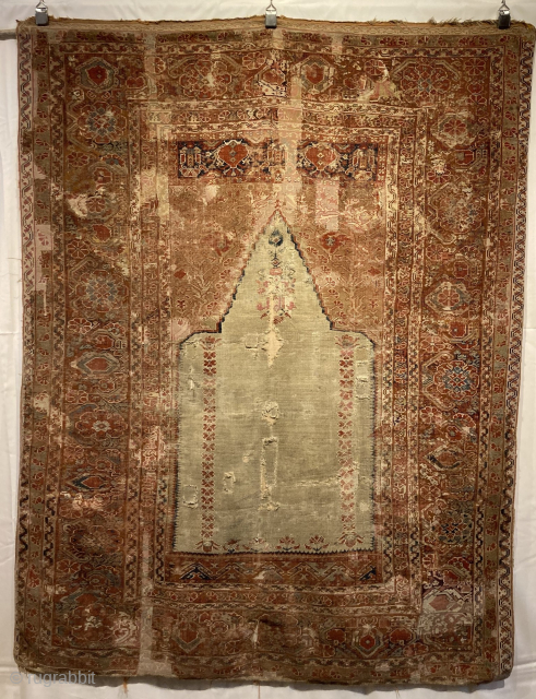18th century Giordes rug. Heavily repaired in the past, the piece has been mounted
1.62m by 1.25m

www.heritage-antique-rugs.com for more images and price or email me at gene@heritage-antique-rugs.com       