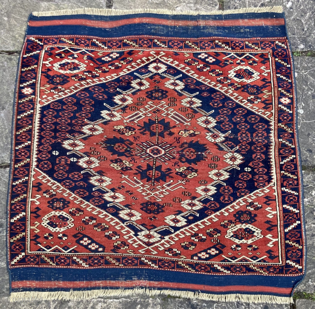Bijou-like 19th century Kis-Bergama wedding rug. Good colours and reasonable condition, but note tension crease repair in the centre.
107cm by 110cm
Contact gene@heritage-antique-rugs.com for more pics, price etc.      