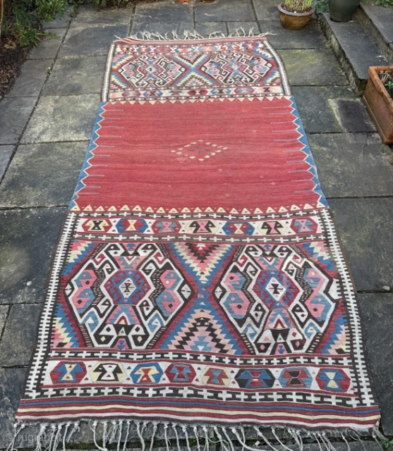 Large antique dowry kelim, from Fetiye, woven to cover the bride's camel. Good condition, note old repair (pictured)
3.25m by 1.48m
Contact gene@heritage-antique-rugs.com for more pics, price etc       