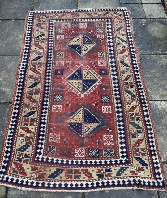 19th century Kazak: great colours, classic design, but very distressed condition, reflected in the price

2.26m by 1.41m

Contact gene@heritage-antique-rugs.com for more pics, price etc          