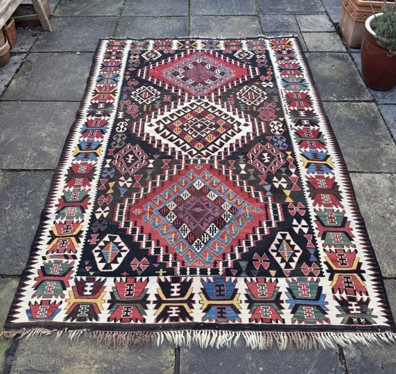 Late 19th century Caucasian kelim, Kuba area. Stunning design and colours, great condition.
2.31m by 1.60m
Contact gene@heritage-antique-rugs.com for more pics, price etc.