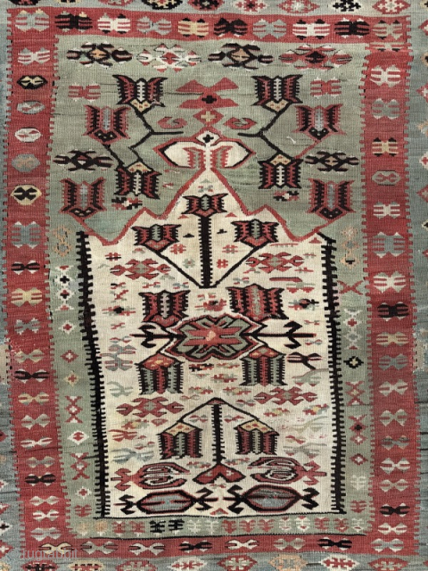 Stunning mid 19th century Usak area niche kelim. Extensive pastel colours. Old repairs around outer edges.
1.75m by 1.63m
Contact gene@heritage-antique-rugs.com for more pics, price etc.         